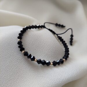 Brățară cu cristale biconice negre fațetate și biluțe din Aur 14K